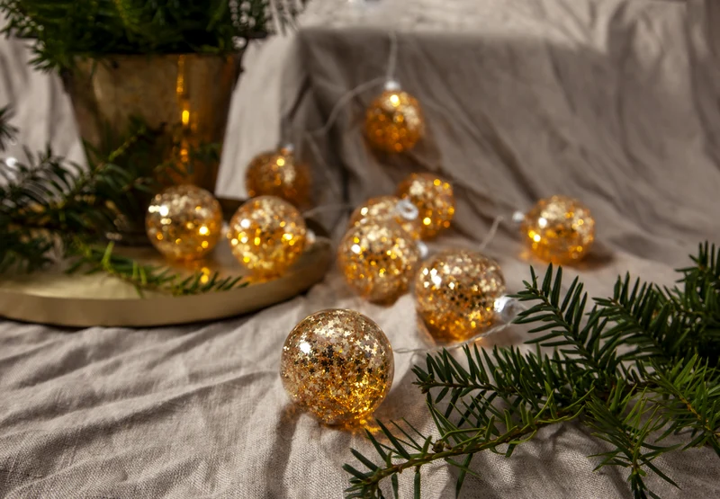 Star Trading LED-Lichterkette "Glitter" 10 goldene Kugeln, Kabel: transparent, 10 warmwhite LED, ca. 130x6 cm, Batterie, Timer, Vierfarb-Karton